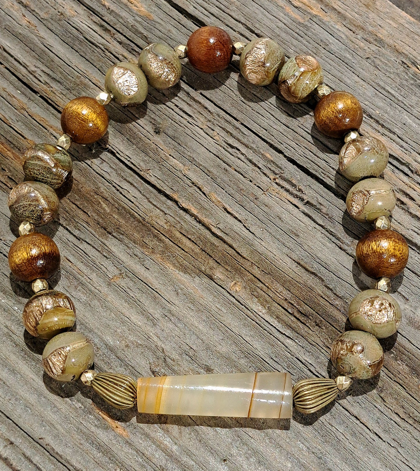 Mens stretch bracelet with gold leaf infused green vintage beads