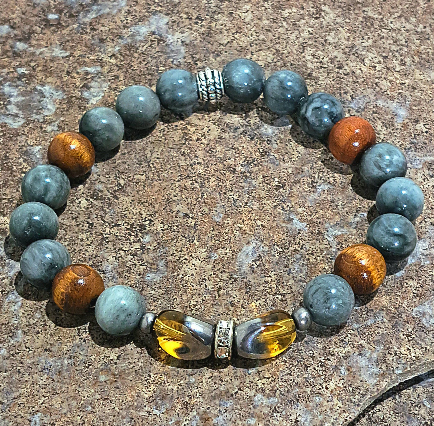 Mens stretch bracelet of grey agate, wood beads, and vintage grey amber glass focal.
