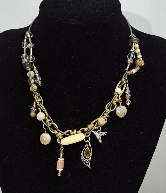 Bohemian inspired Grey leather and chunky brass link necklace.