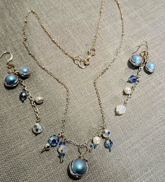 Ladies one of a kind Swarovski blue pearl necklace and earring set on silver