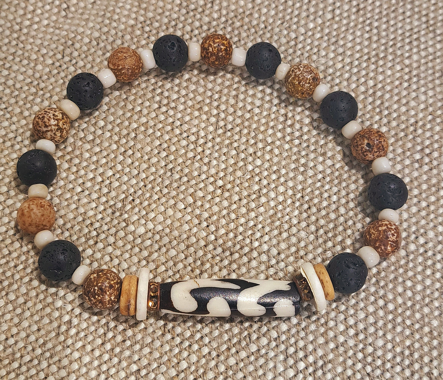 Mens Stretch bracelet of black lava, shell and Batik dyed bone focal