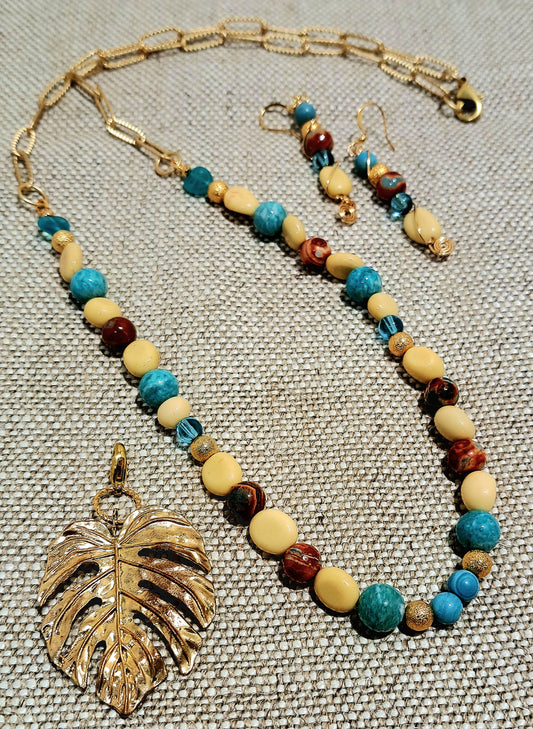 Ladies Multi bead on gold paperclip chain with large gold leaf focal and earrings set