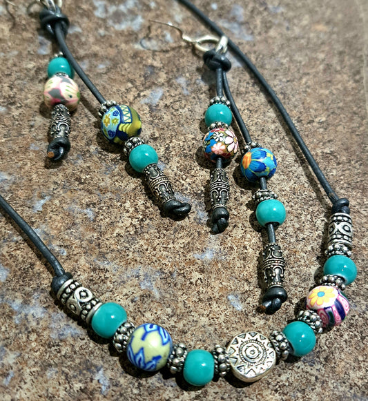 Ladies grey leather short necklace and earrings with polymer beads