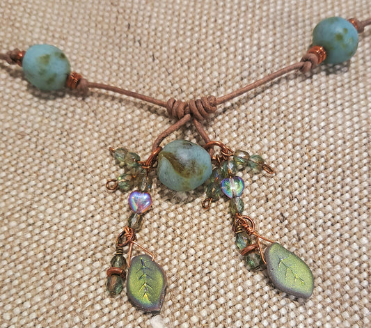 Ladies Buff leather string necklace with blur/green African recycled glass