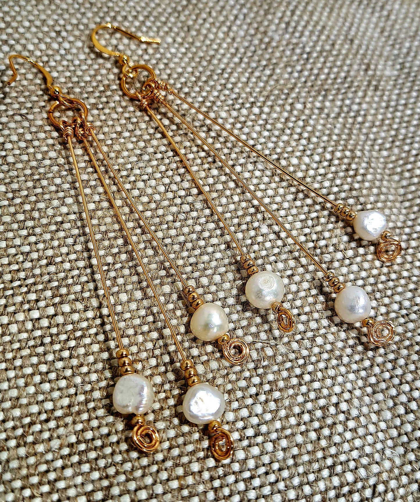Elegant Gold stems and fresh water pearl dangle earrings.