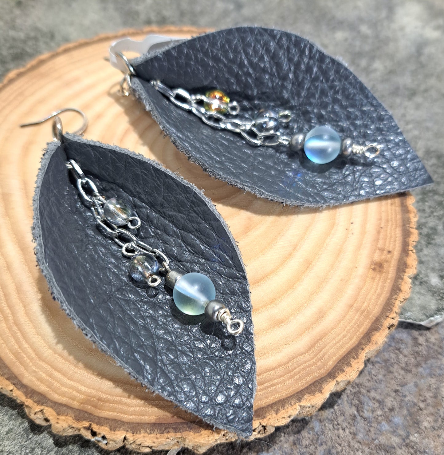 Ladies grey leather leaf earring with silver chain and opaque glass mixed beads.
