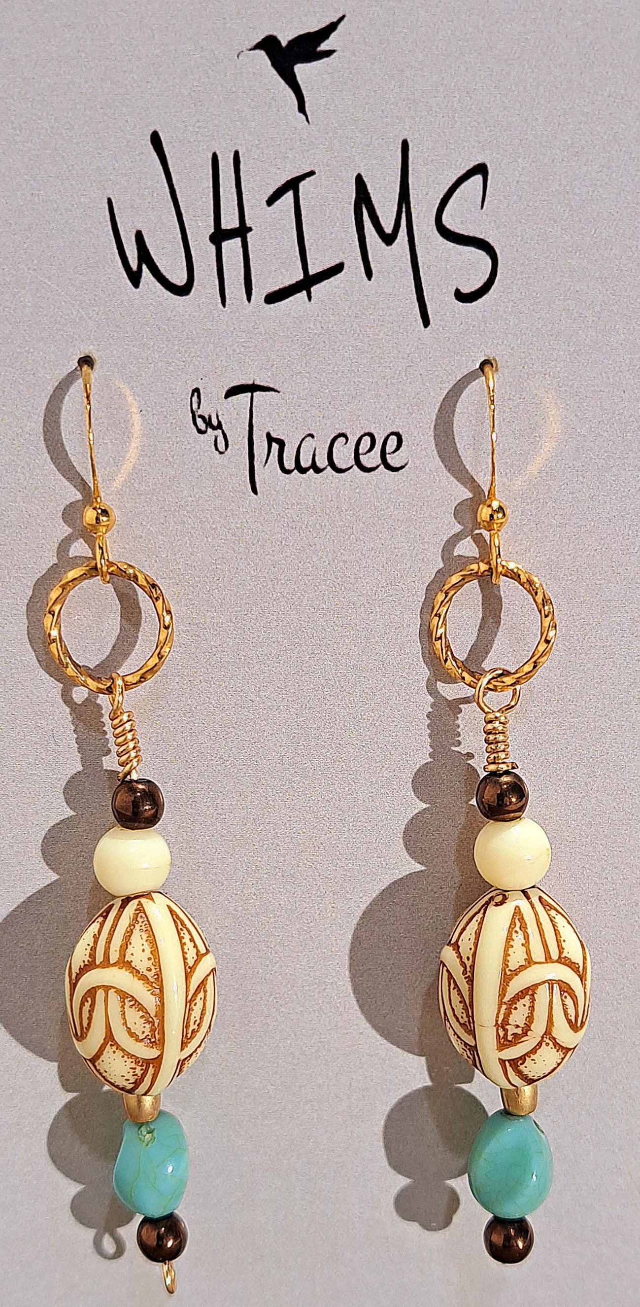 Ladies vintage carved beads with turquoise and bone accents .