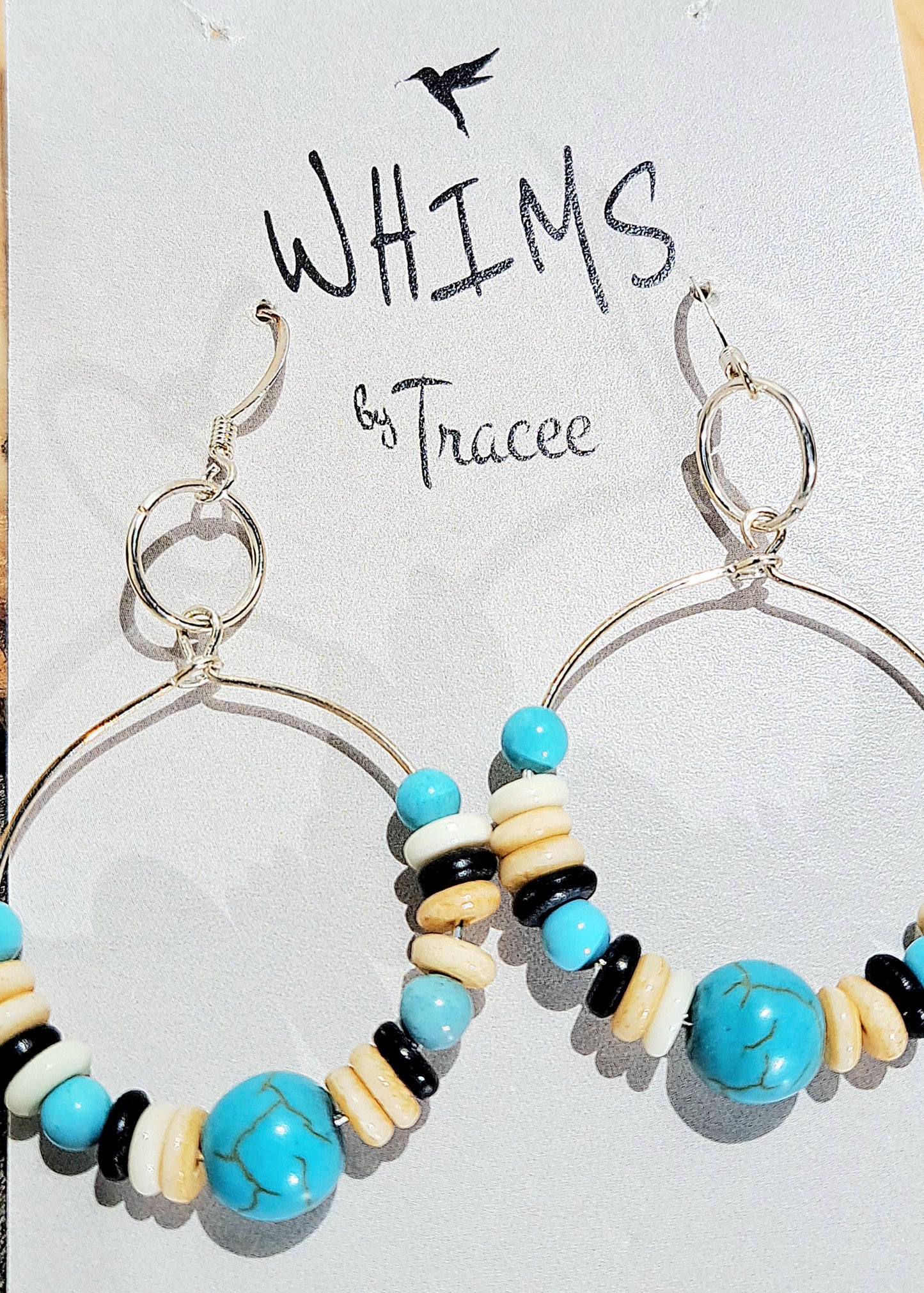 Ladies 1" hoop earrings with turquoise and ivory and brown heishi beads.