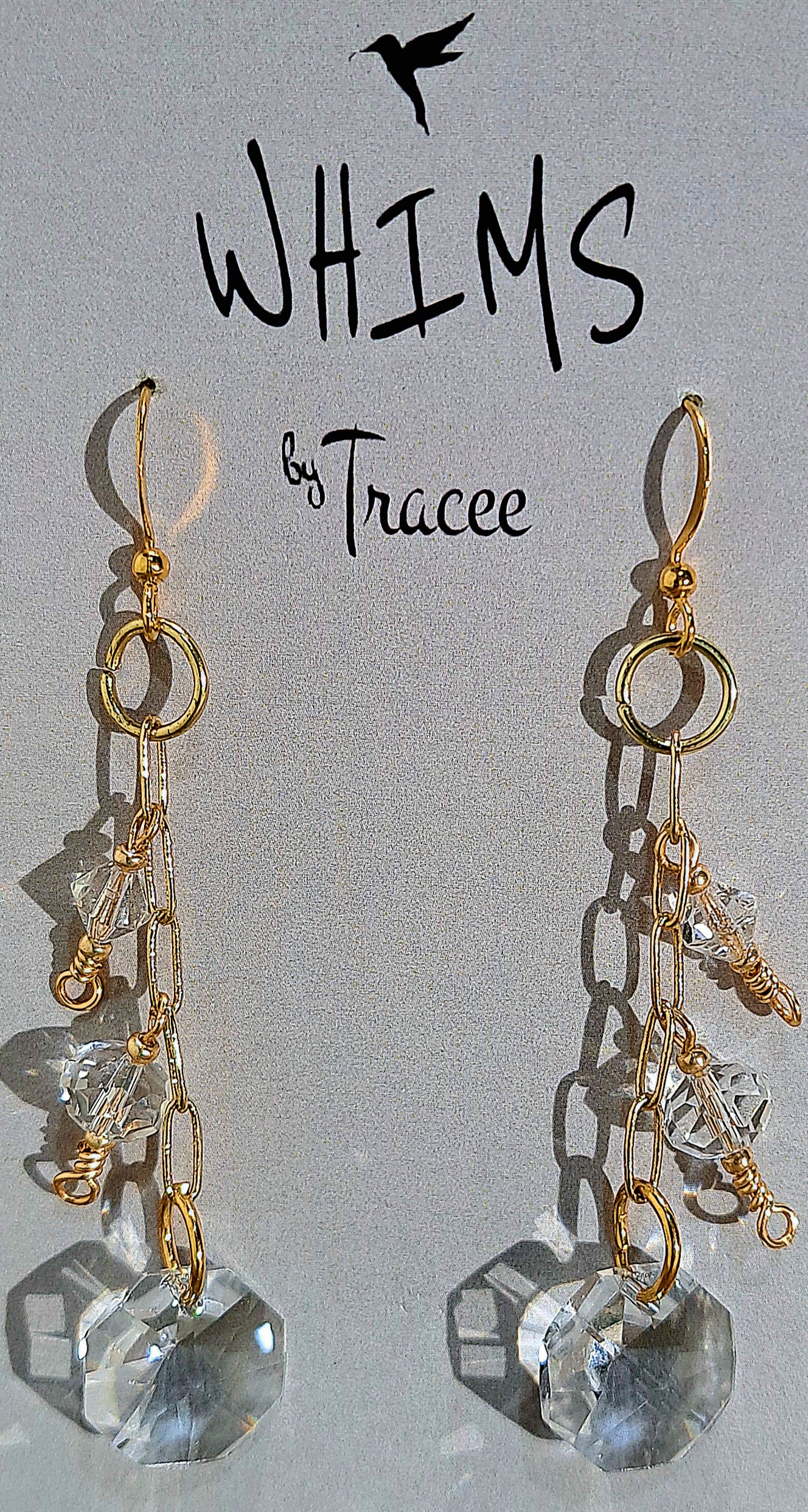 Ladies vintage crystal chandelier earrings on paperclip chains.