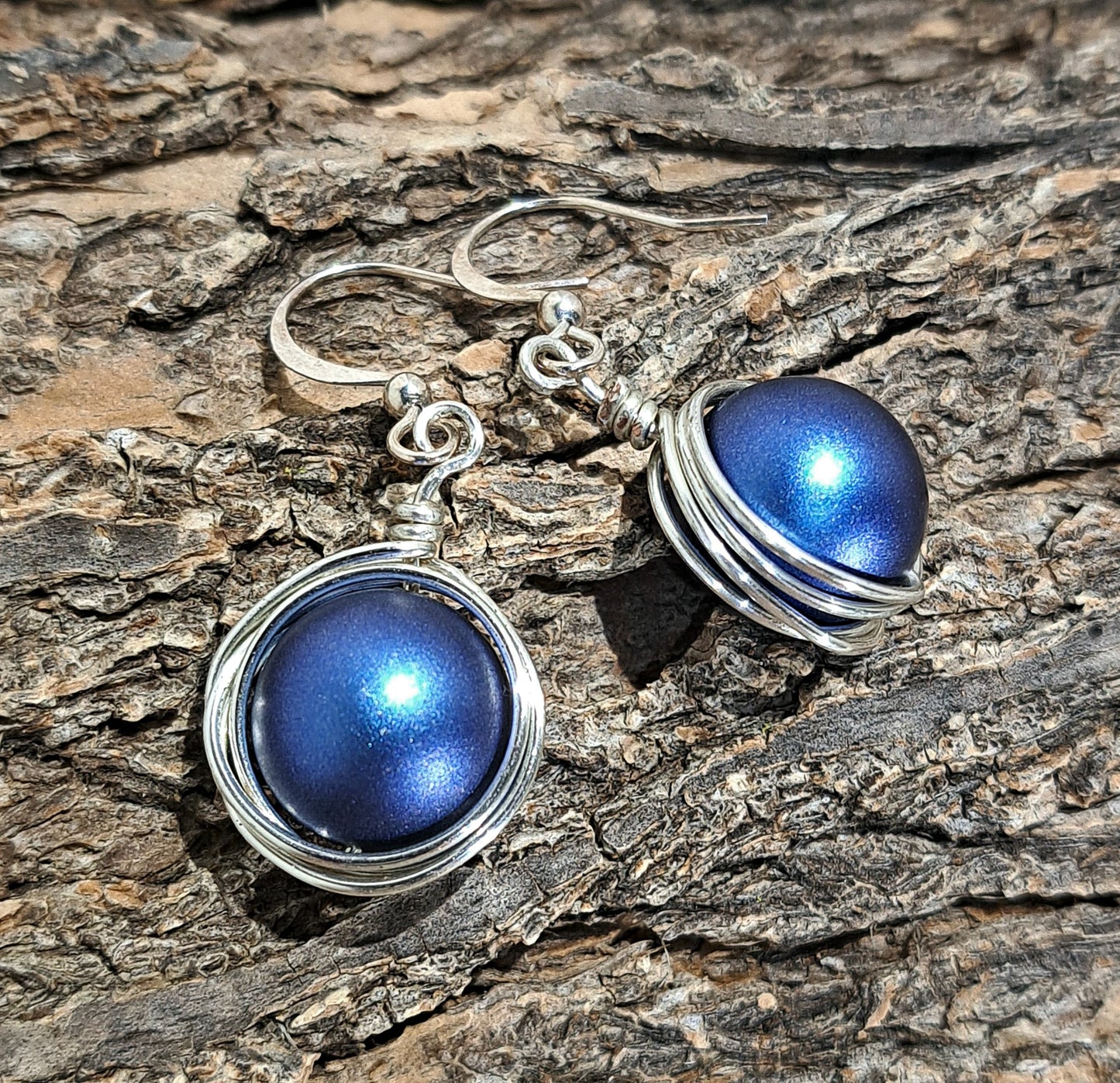 Ladies Swarovski royal blue pearl wire wrapped silver.