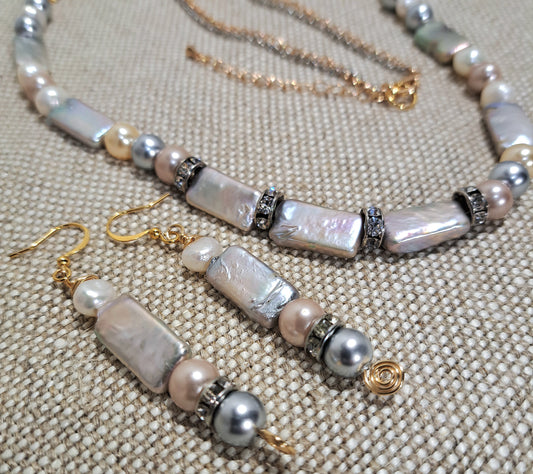 Lades necklace and earring set featuring Japanese Biwa Pearls n silver and gold.