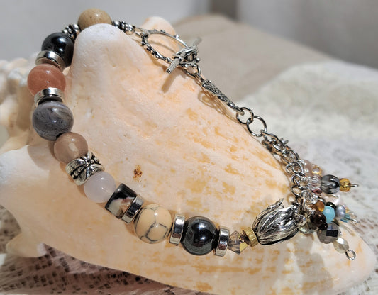 Ladies mixed gem stone beaded bracelet with steel Irish knot charm.