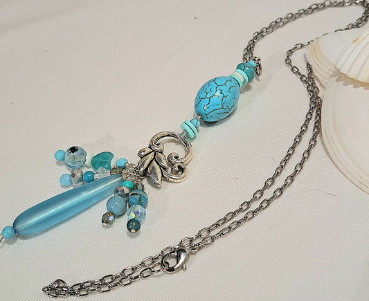 Ladies turquoise focal necklace on steel chain with Sea Glass and steel charm features