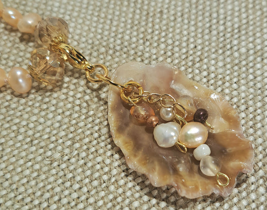 Ladies adjustable leather and strung fresh water pearl and crystal necklace.