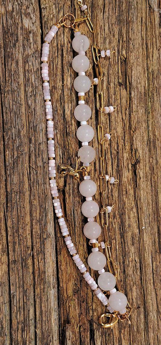 Ladies 3 strand Rose quartz gemstone, paperclip chain, and mother of pearl bracelet.