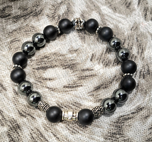 Mens stretch bracelet of hematite, matte black onyx and steel spacers