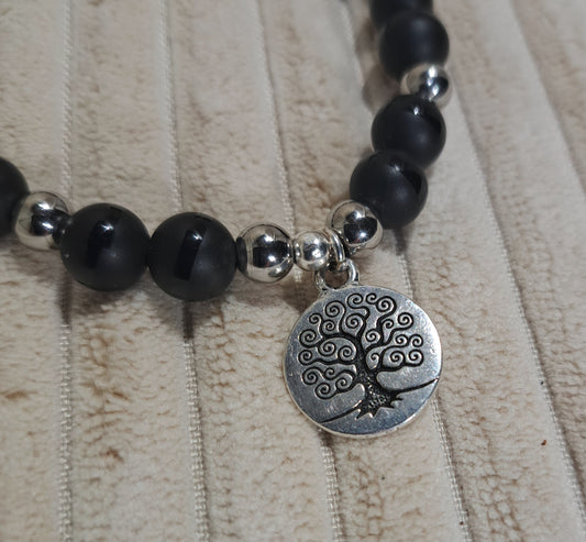 Unisex Tree of Life stretch bracelet of striped Black Onyx and Steel spacers.