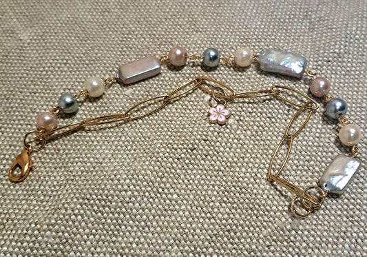 Ladies double strand paperclip chain and Biwa and mixed pearl bracelet.