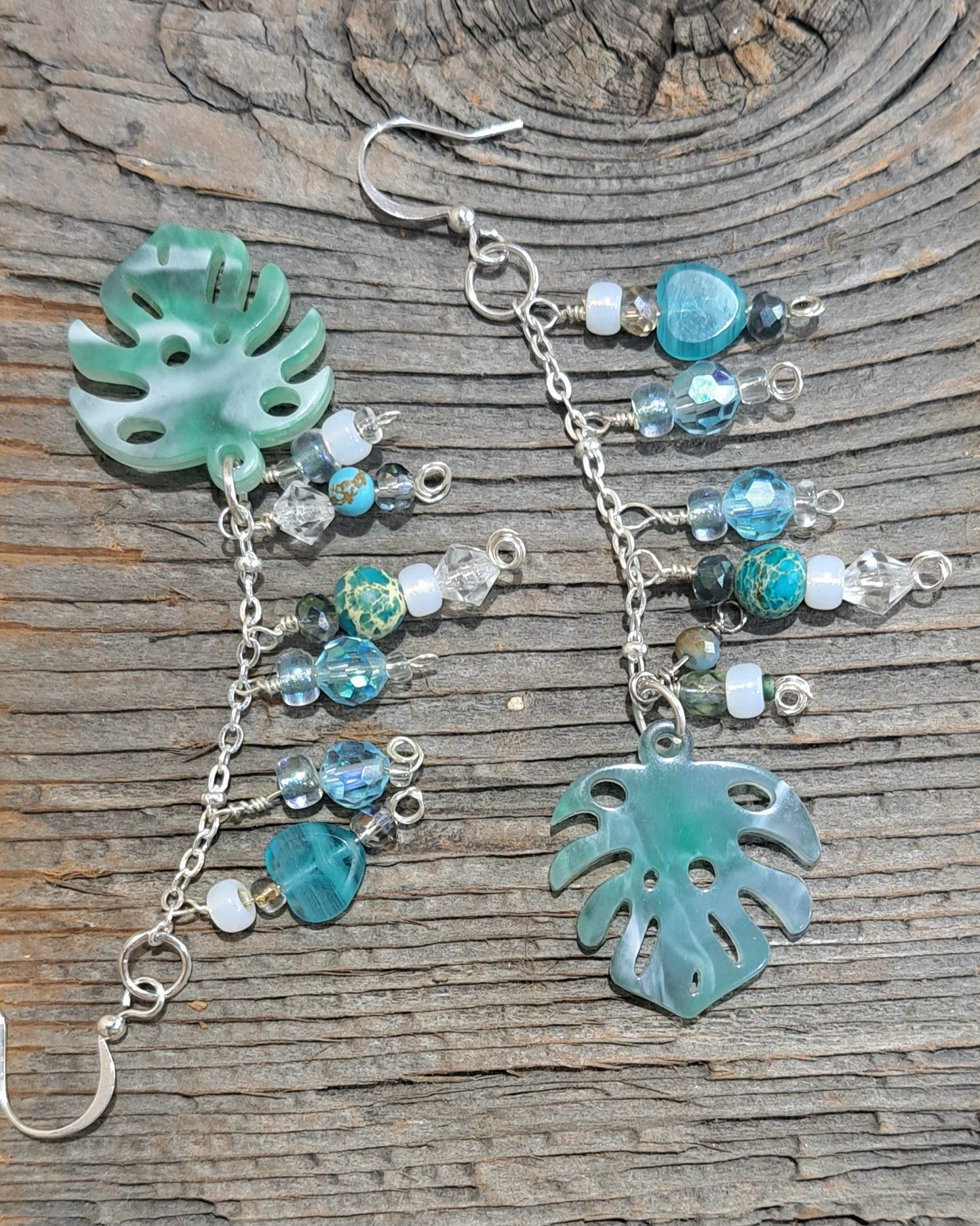 Ladies Acetate Leaf and assorted beads dangle earrings.