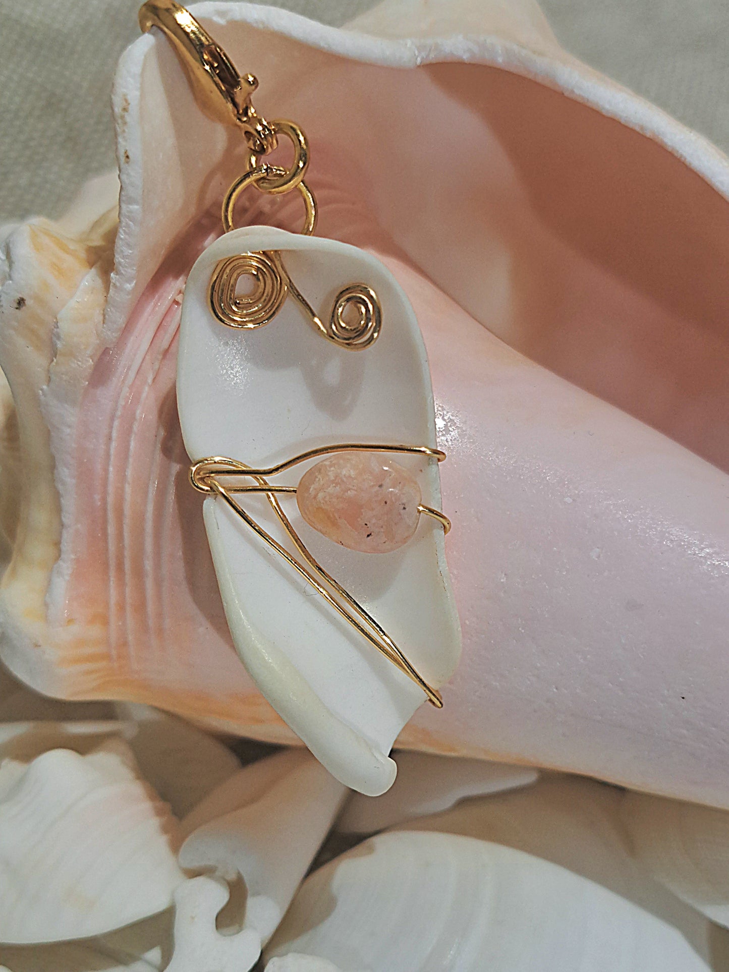 Sea Shell pendant with gold wire wrapping and free form Opal gemstone focal.