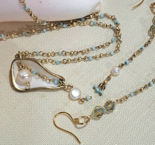 Sea Shell Necklace and earring with embellished satellite chain and fresh water pearl details