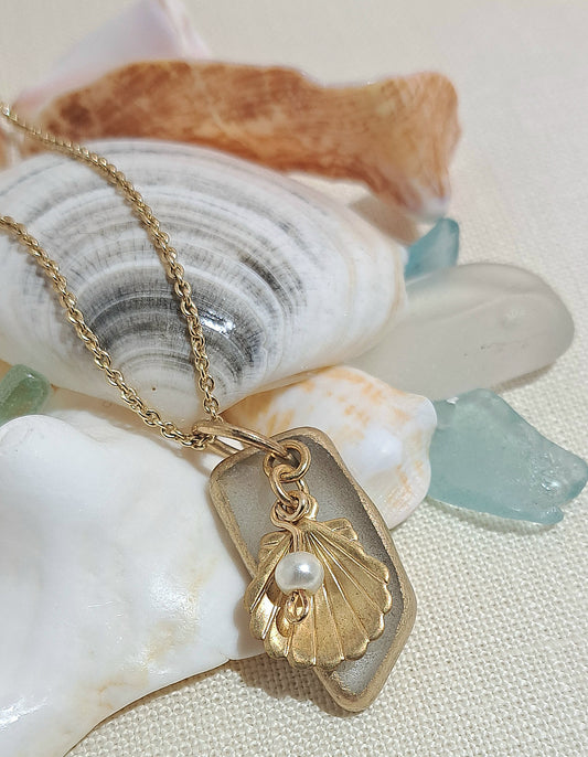 Sea glass Necklace with clam shell and pearl charm.