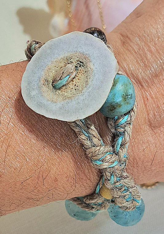 Jute double wrap bracelet with blue African glass, wood, and large metal focal bead.