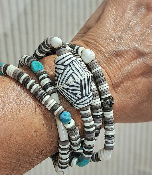 Heishi stretch necklace in neutrals with turquoise accents.