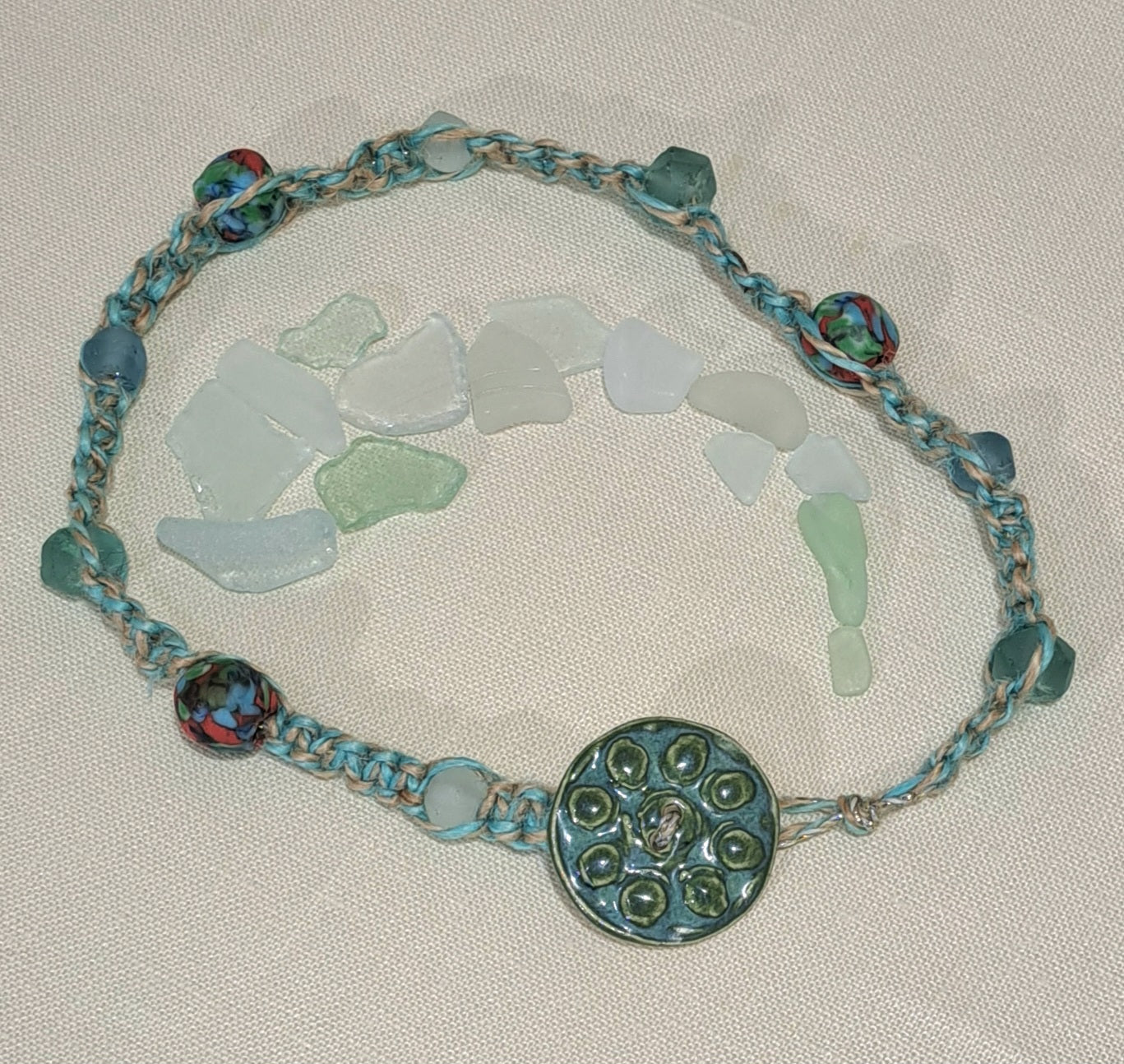 Ladies double wrap green/blue bracelet with large ceramic button and java glass.