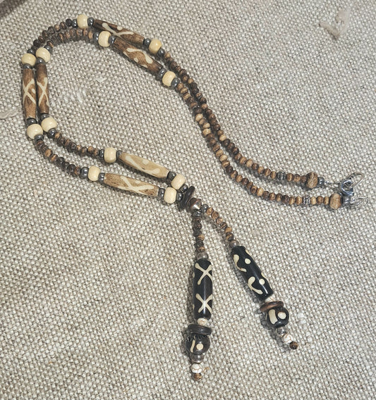 Ladies African inspired neutral beaded necklace with batik painted bone tube beads