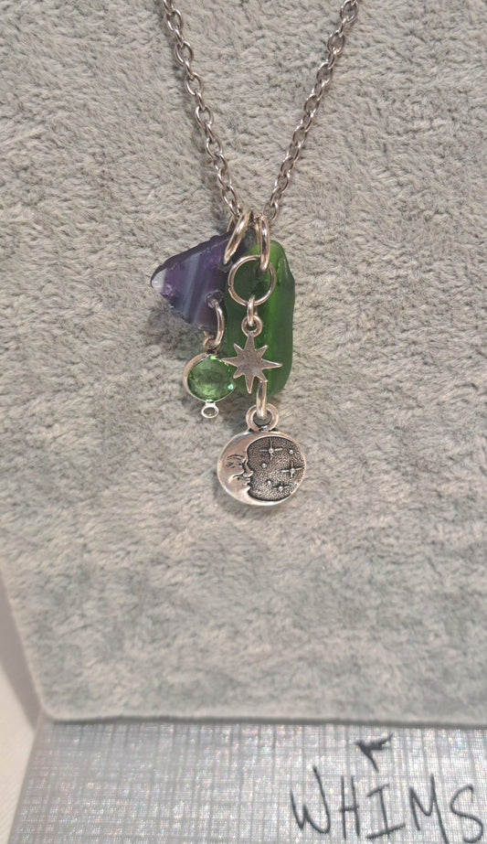 Two piece sea glass necklace with moon and star charm.