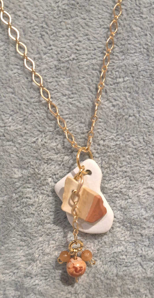 Caymanite chip with white sea glass tile pendant necklace on triangular satin Hamilton chain.