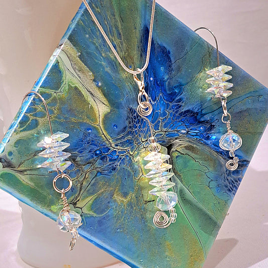 Ladies vintage crystal and silver necklace and earring set.