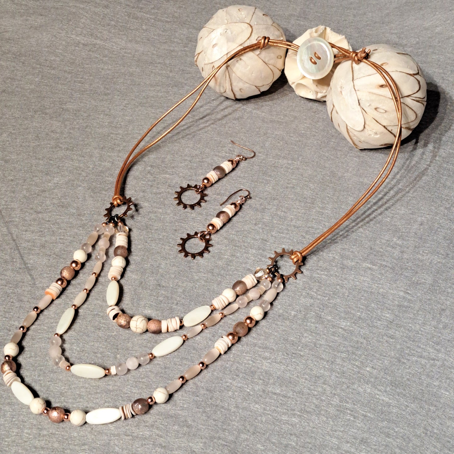 Ladies Mother of Pearl and copper beaded 3 strand necklace.