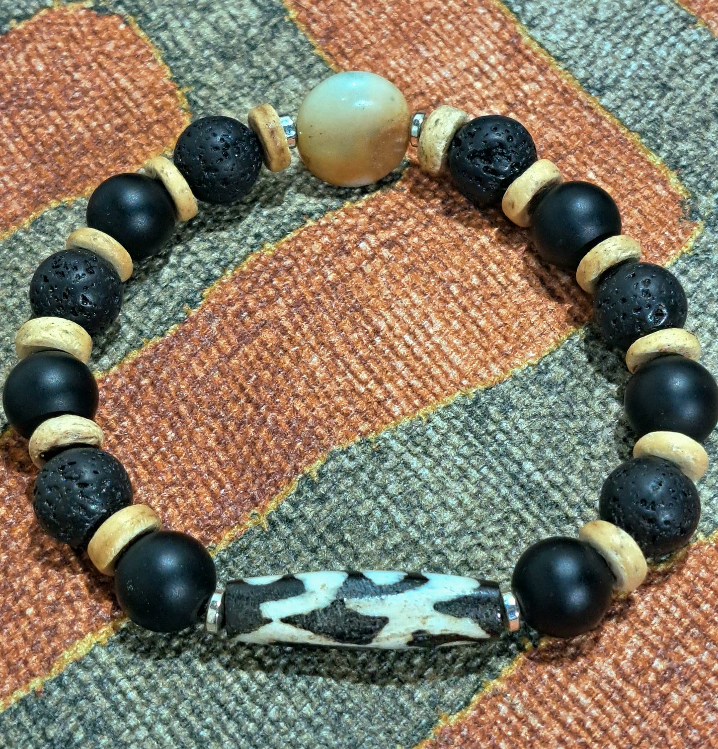 Mens stretch bracelet African inspired bracelet with Batik bone focal.