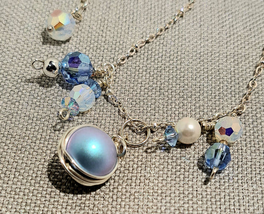 Ladies one of a kind Swarovski blue pearl necklace and earring set on silver