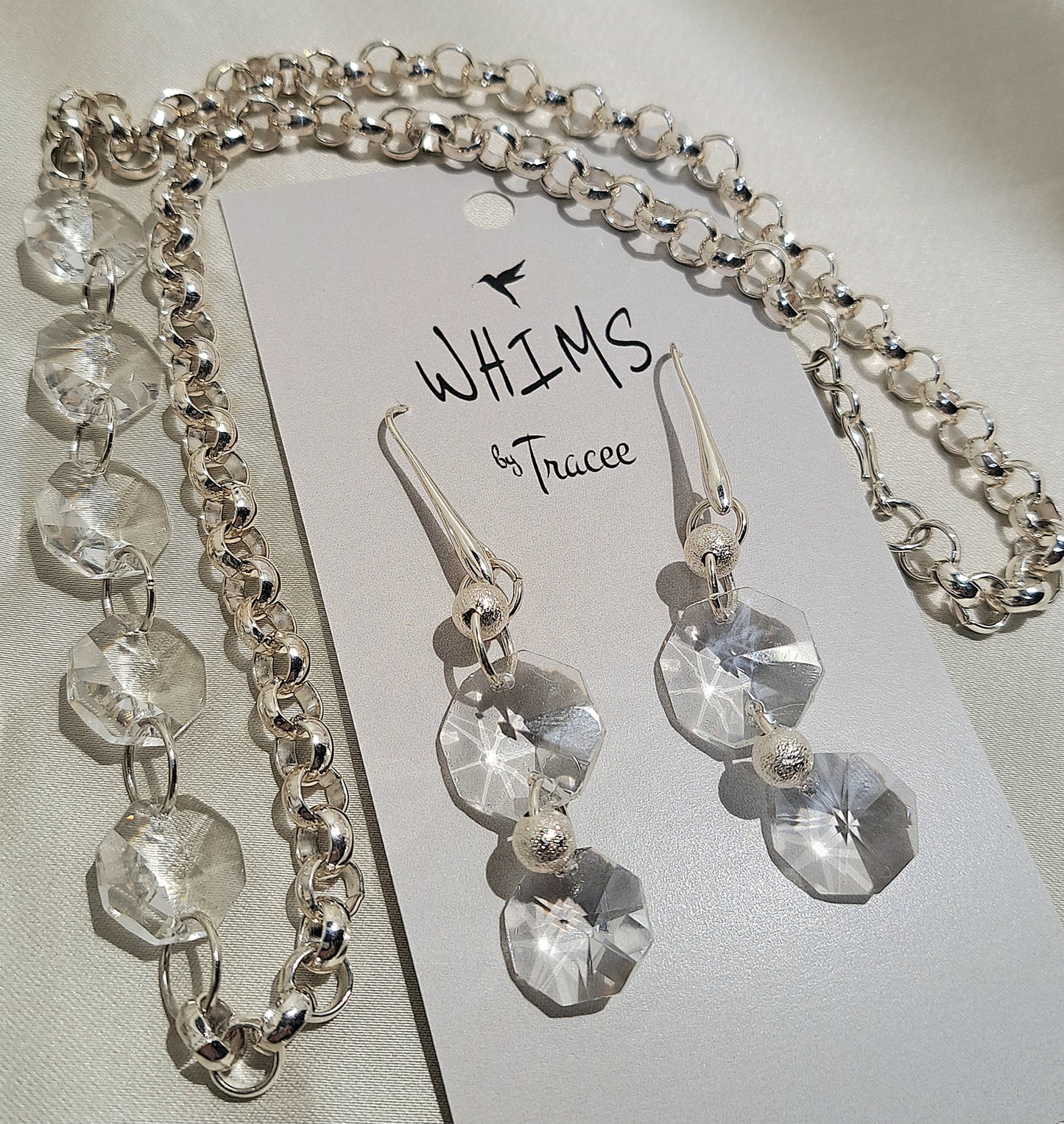 Ladies Crystal chandelier necklace on rollo silver chain and coordinating earrings set.