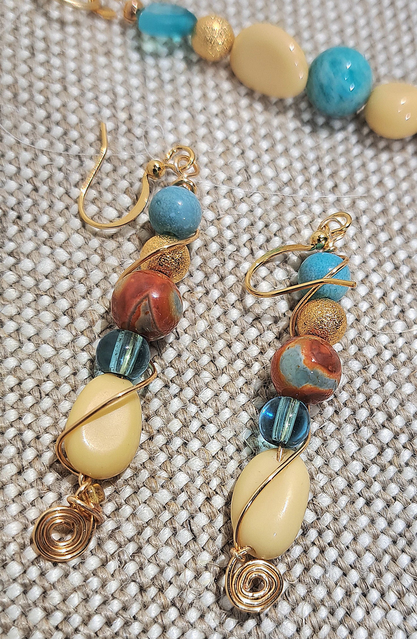 Ladies Multi bead on gold paperclip chain with large gold leaf focal and earrings set