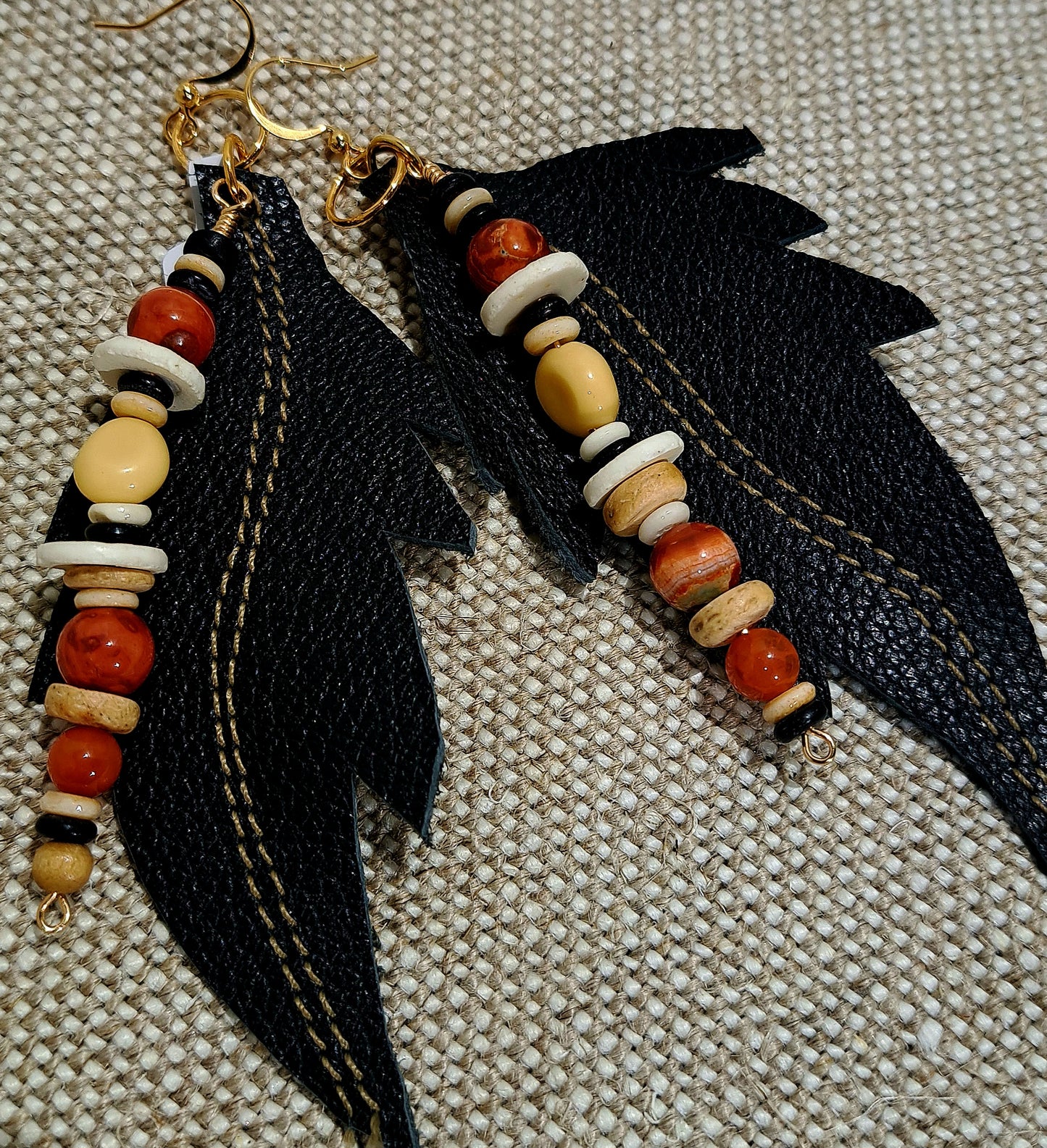 Ladies black leather leaf earring with carnelian and bone accents