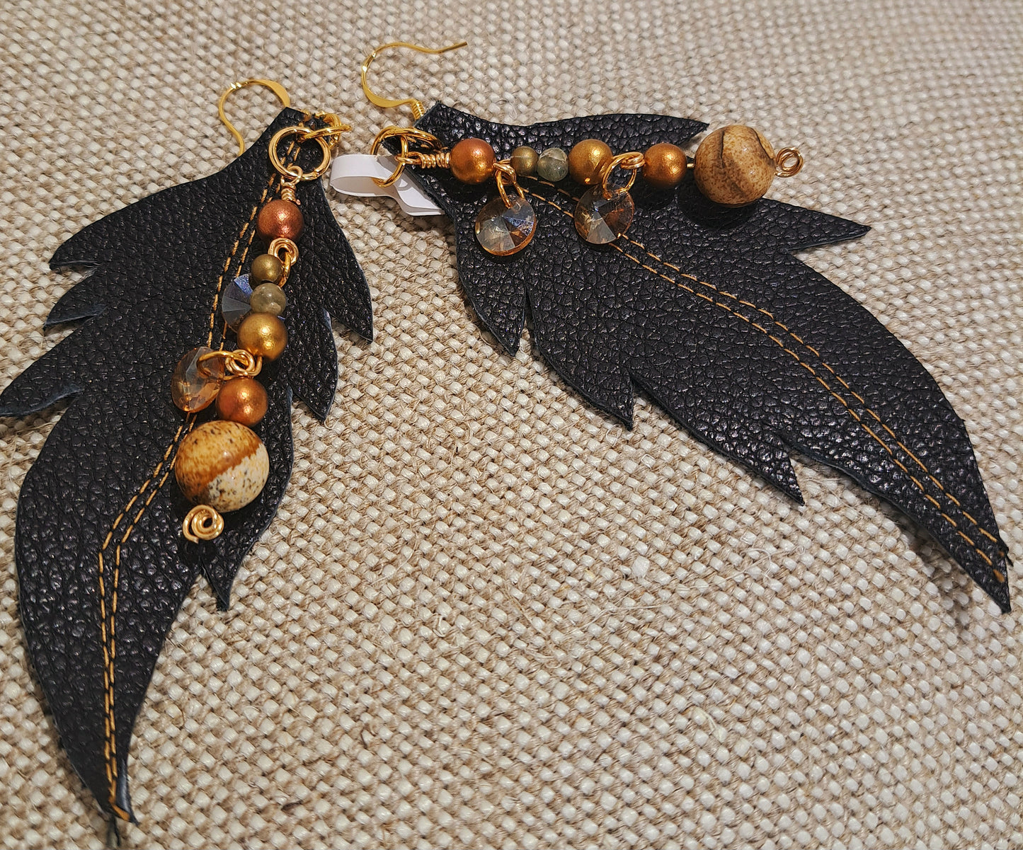 Ladies black leather leaf earrings with vintage crystal discs and jasper.