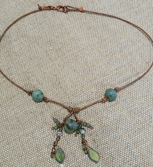 Ladies Buff leather string necklace with blur/green African recycled glass
