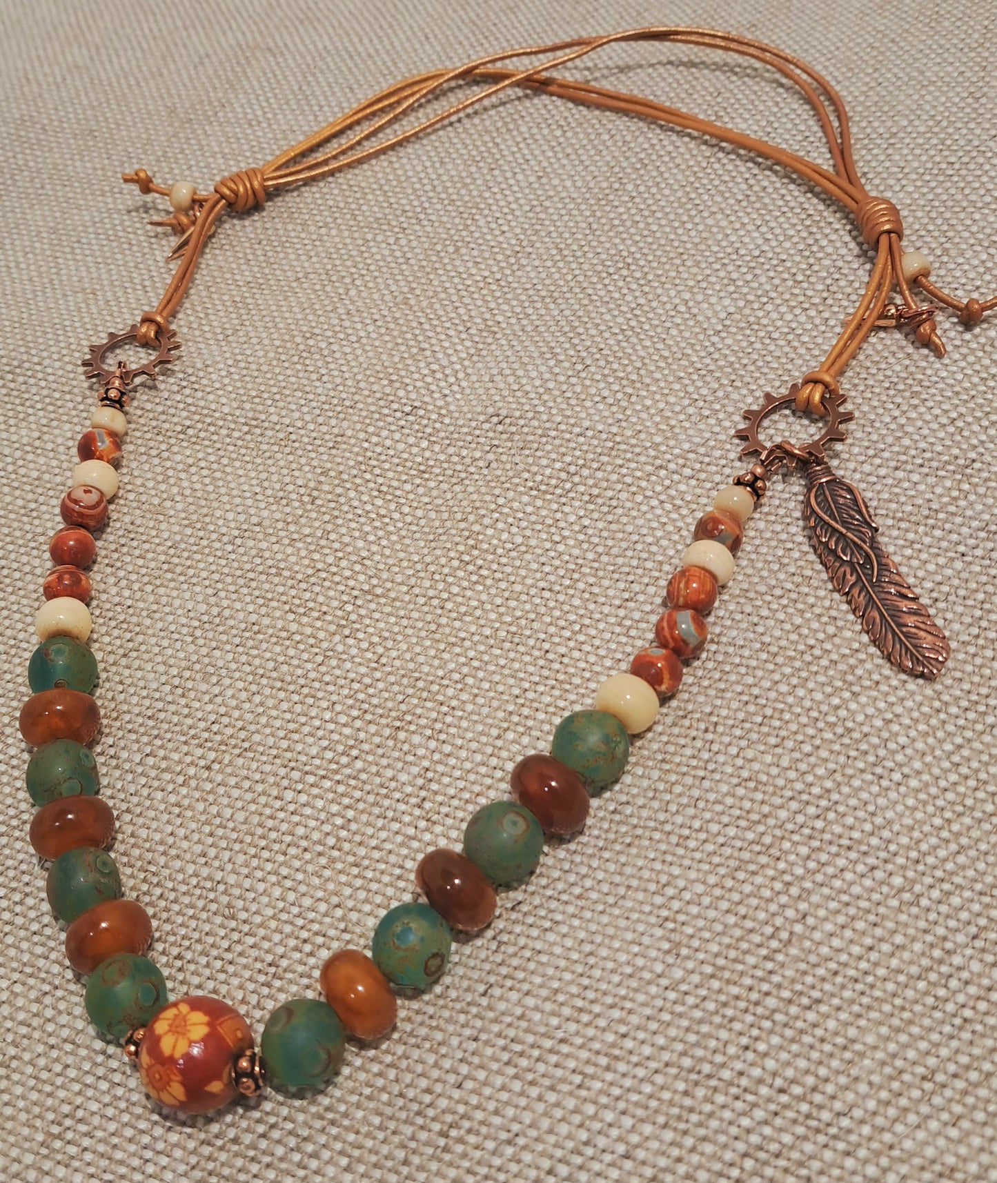 Ladies adjustable bronze string leather necklace with African glass and agate beads
