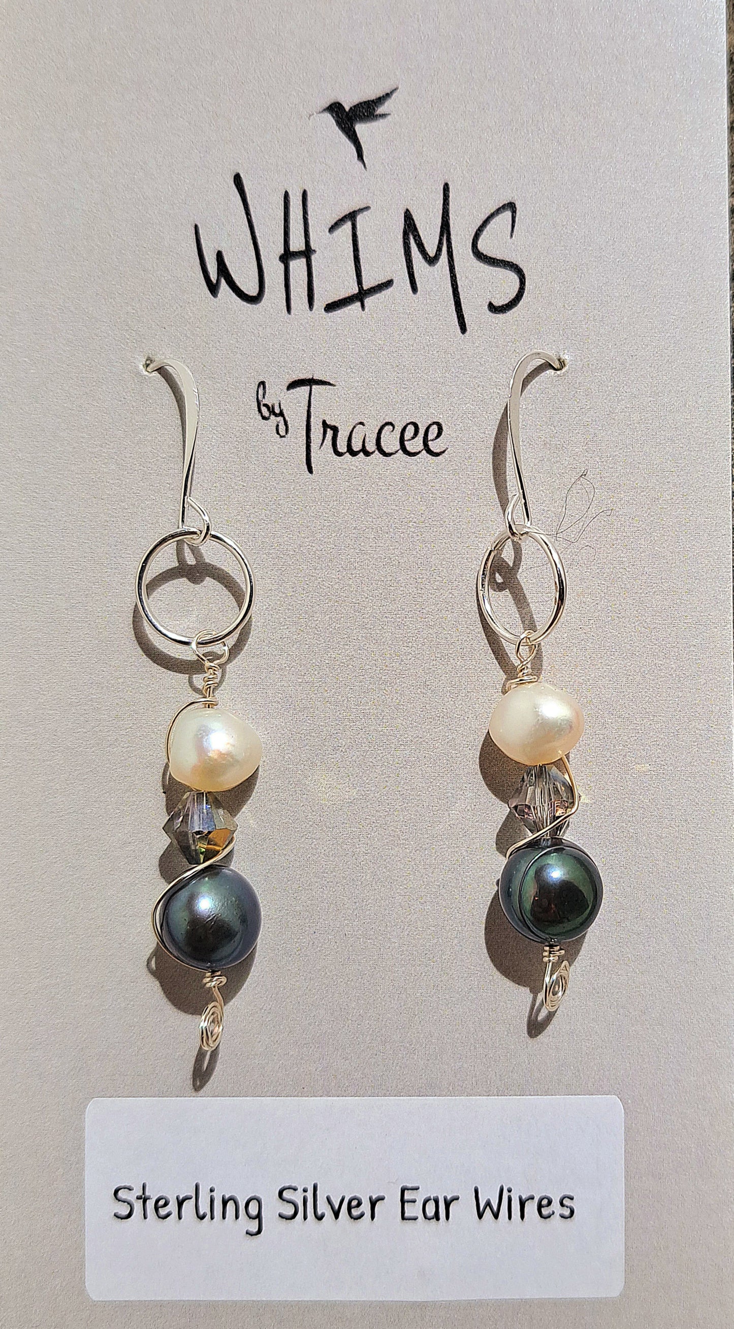 Ladies pearls on sterling silver earrings.