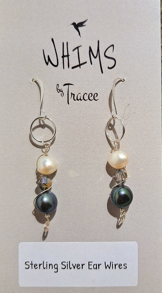 Ladies pearls on sterling silver earrings.