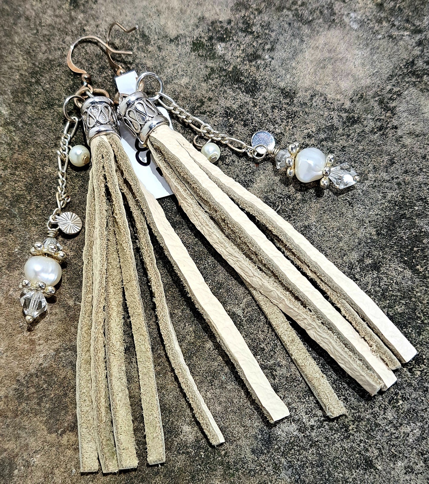 Ladies Ivory leather tassel earrings with chain and pearls and a bit of crystal.