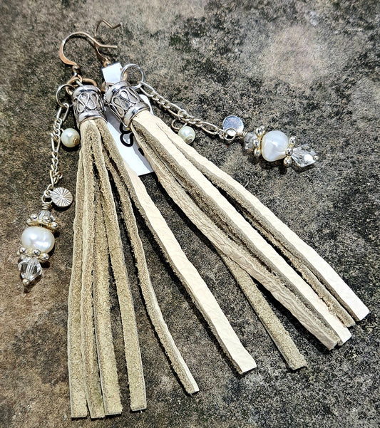 Ladies Ivory leather tassel earrings with chain and pearls and a bit of crystal.