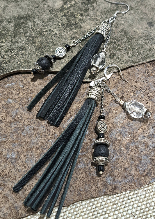 Ladies black leather tassel earrings hanging from Steel bails and chain dangles with beads.