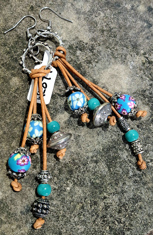 Ladies natural leather cord dangle earrings with Bohemian Polymer beads.