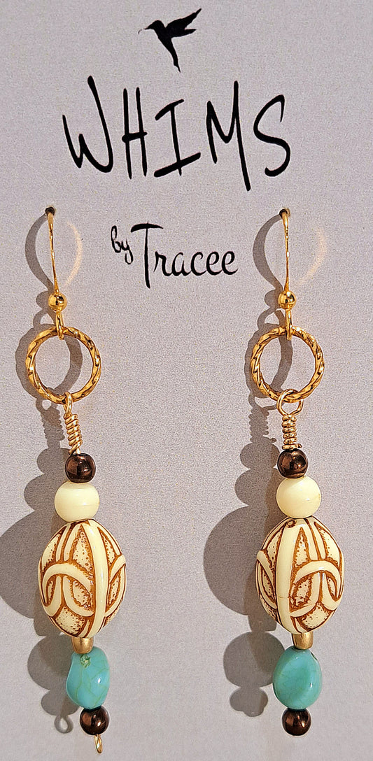 Ladies vintage carved beads with turquoise and bone accents .