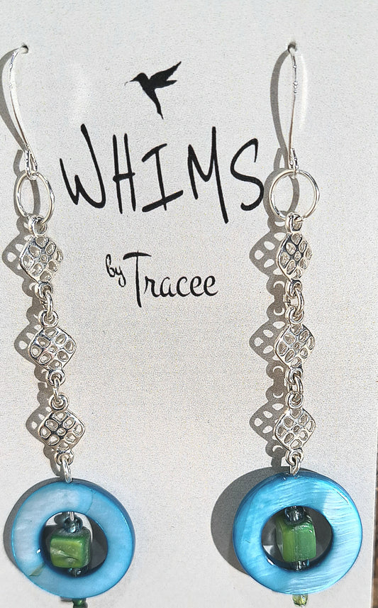 Ladies Mod dangle earrings with blue circles and green squares.